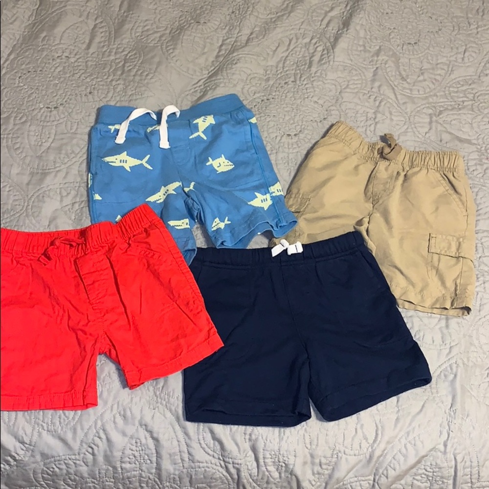 Set of 4 shorts. Between 18 mo-2T. All same fit